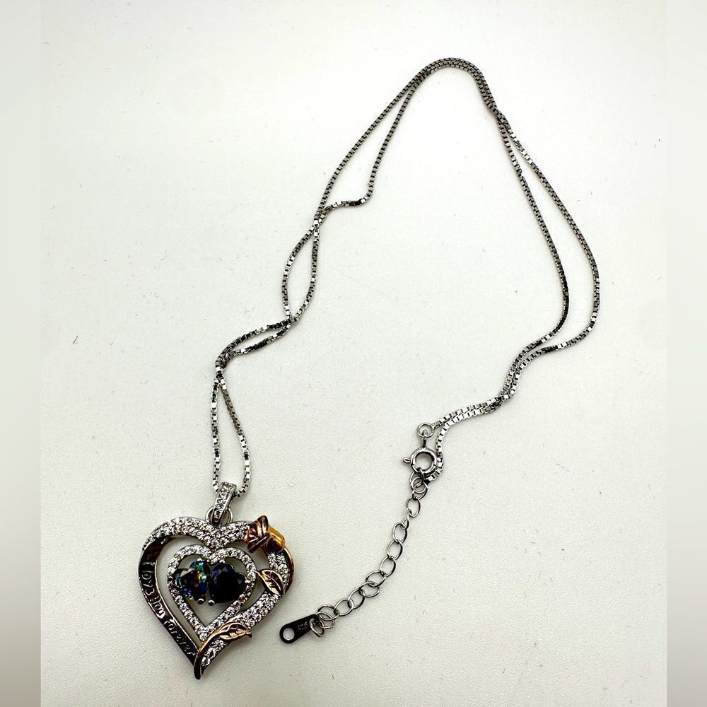 NIB Sterling silver, possibly gold plated, heart necklace with cz diamonds!